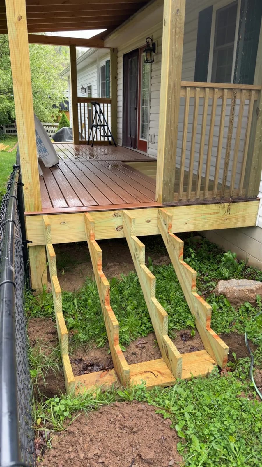 Composite deck installation with new stair stringers cut and set